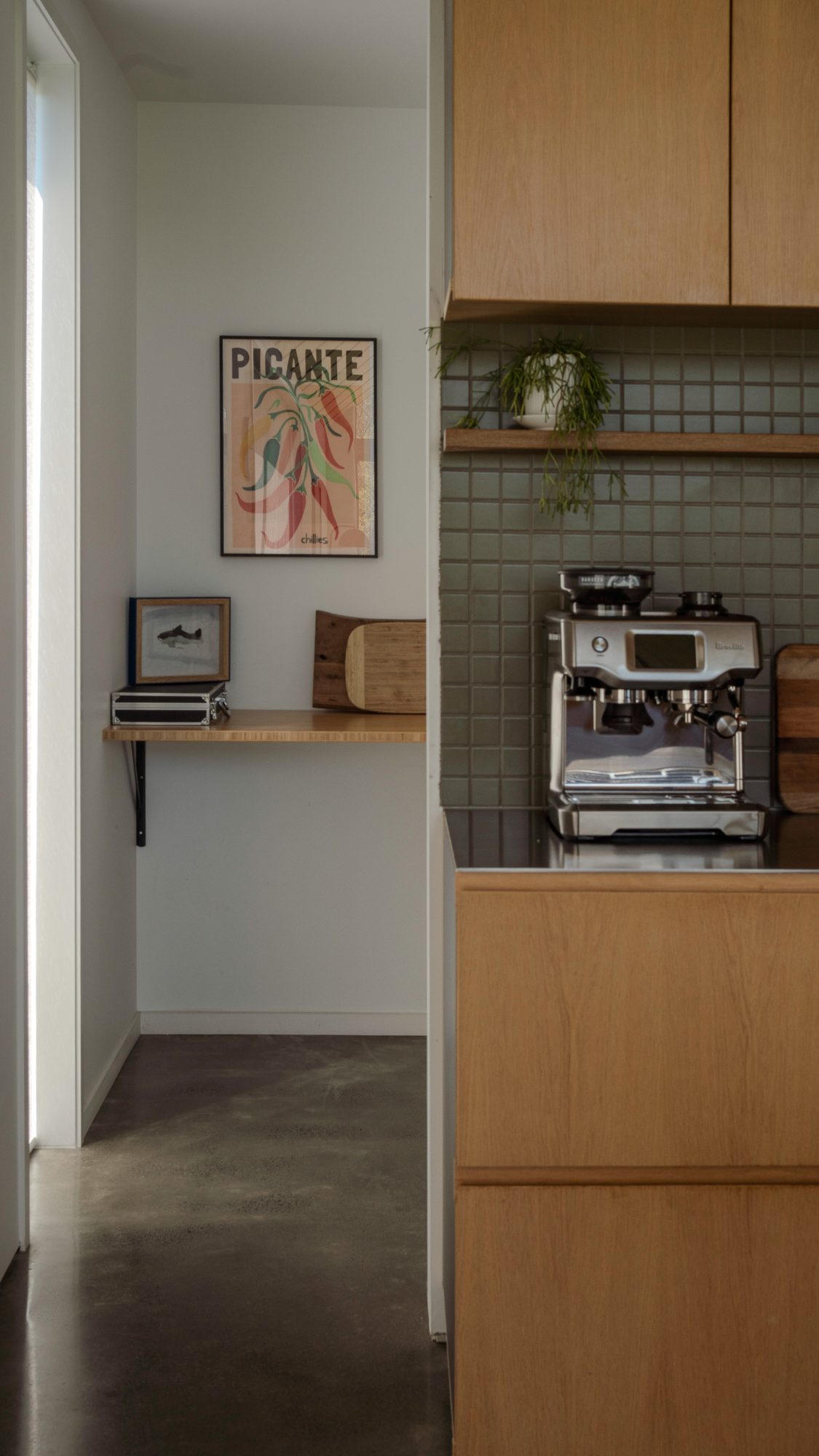 Awa Coastal kitchen and pantry nook with framed print, Whangapoua interior photography NZ