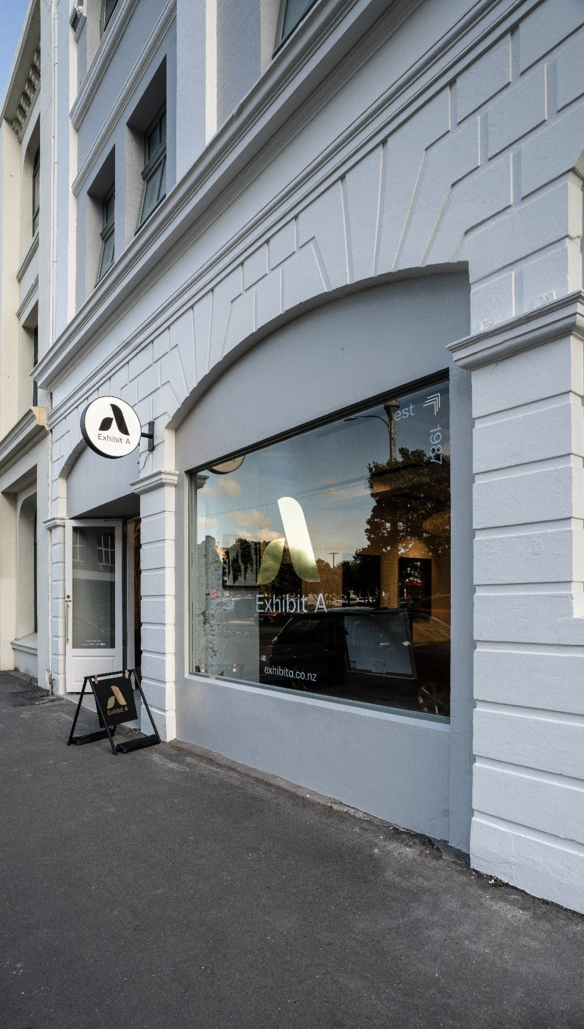Exhibit A storefront at dusk, Wellington commercial photography NZ