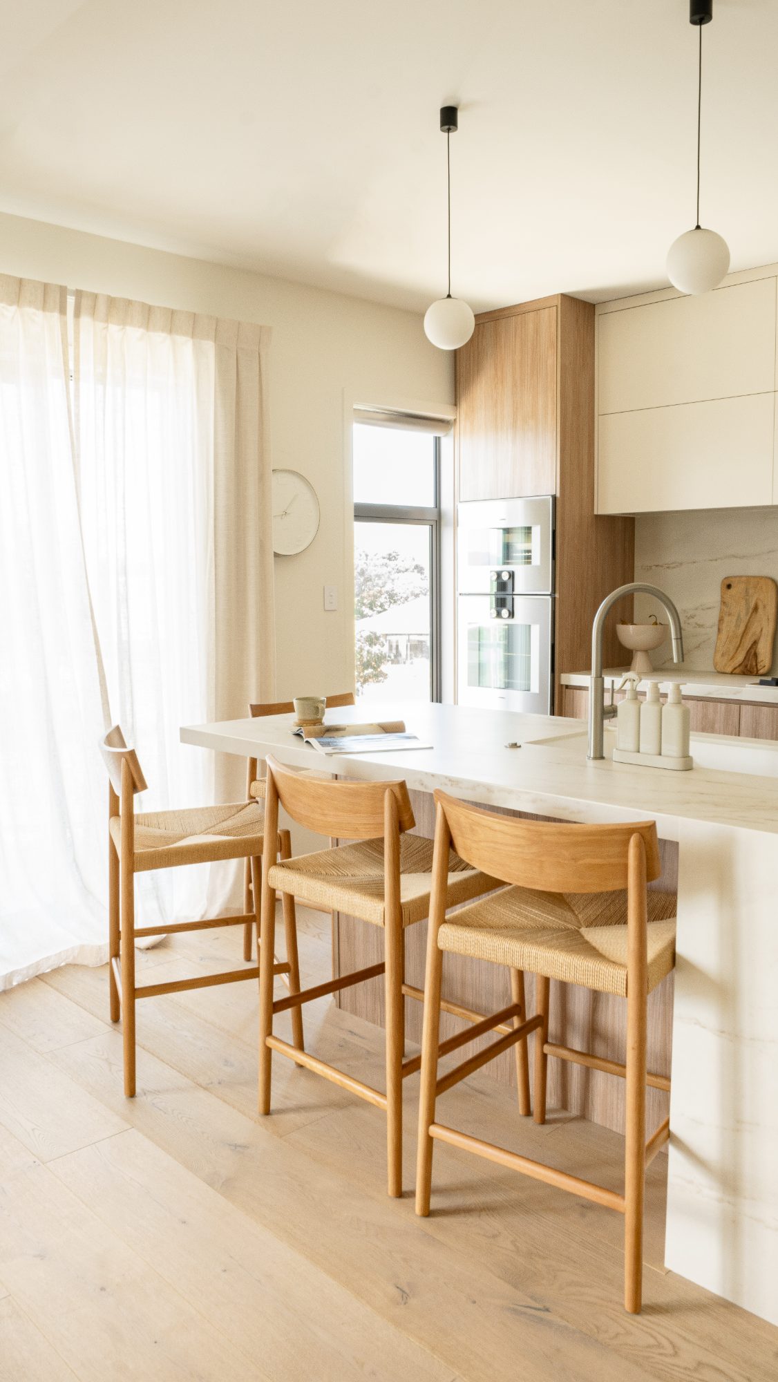 Frame House kitchen with oak joinery, Wellington interior photography NZ