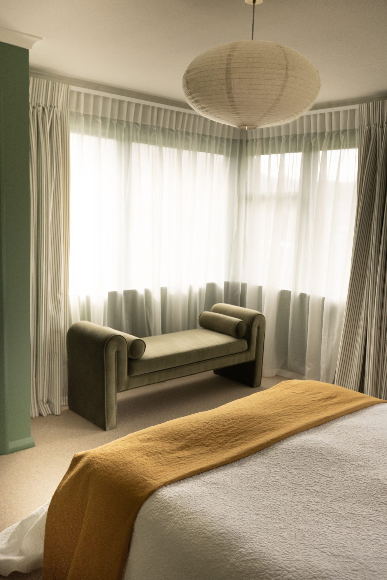 Mabel House bedroom bay window with natural light, Wellington interior photography NZ