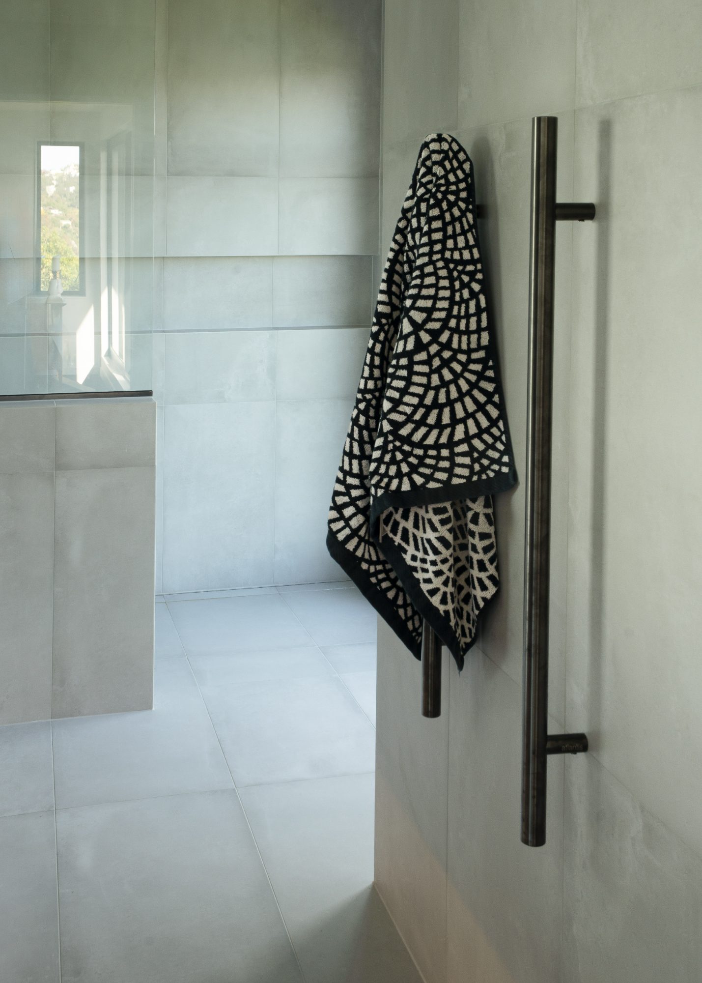 Seatoun Heights ensuite with black timber vanity and concrete tile, Wellington interior photography NZ