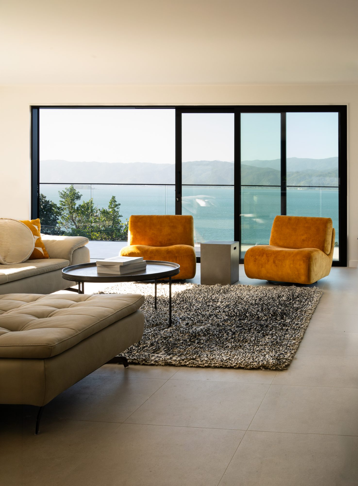 Seatoun Heights living room looking out to Wellington harbour, interior photography NZ