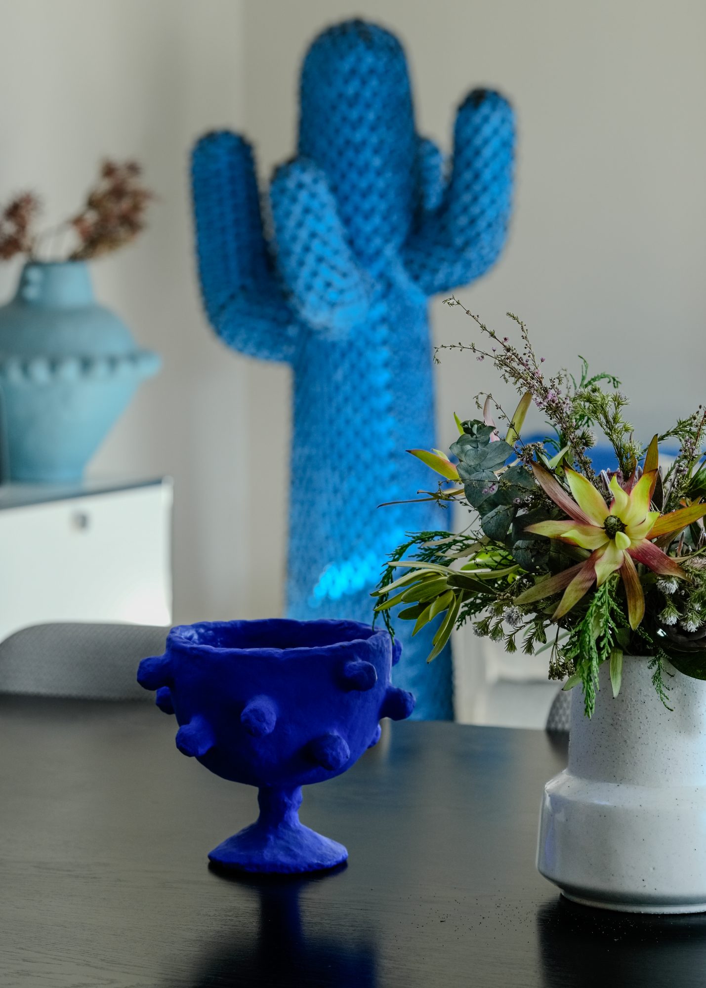 Seatoun House cobalt ceramic vessel on dining table, Wellington interior photography NZ