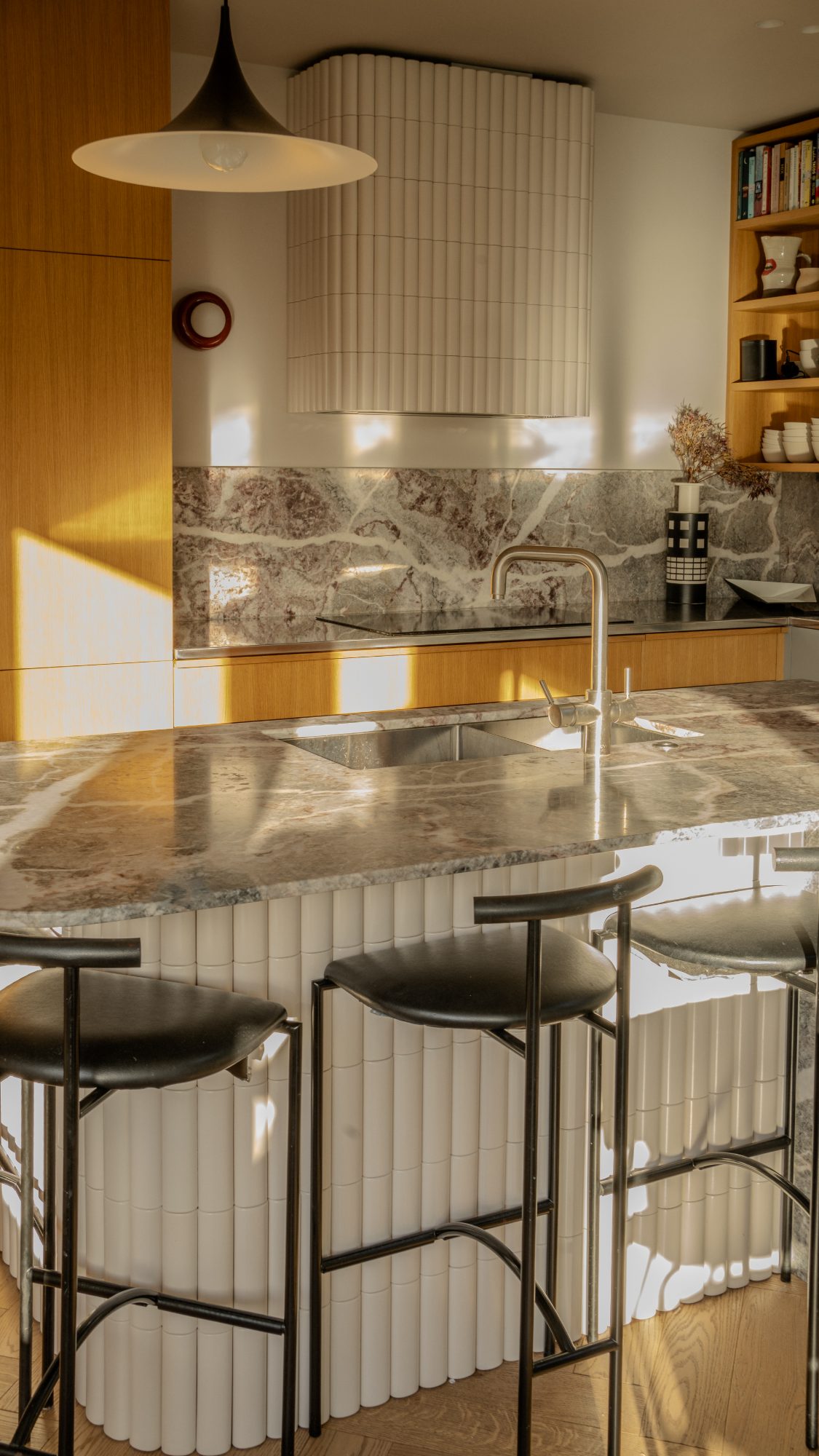 Seatoun House kitchen island in late afternoon light, Wellington interior photography NZ